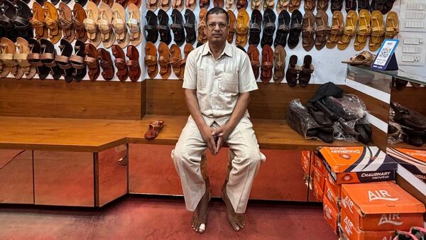 Balkrishna Gavali, owner of Tip Top Footwear, a store in Chappal Gully. Balkrishna Gavali, owner of Tip Top Footwear, a store in Chappal Gully.
